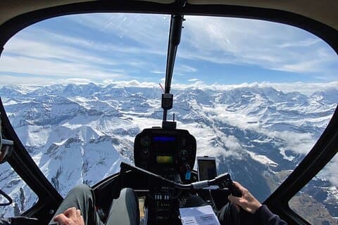 Enjoy a perfect view out of the cockpit to the Swiss Alps