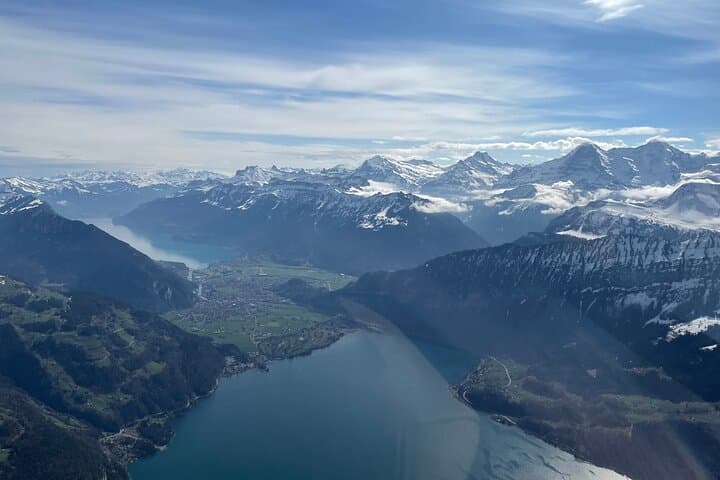 Interlaken, the city in between the two mountain lakes with the high sumits in the back.
