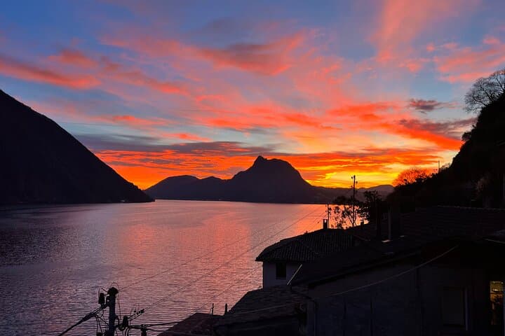 Sunset view from Gandria toward Lugano and San Salvatore