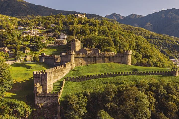 Alps by Train to Ticino: Castle, Stone Village, Lake & Local Food