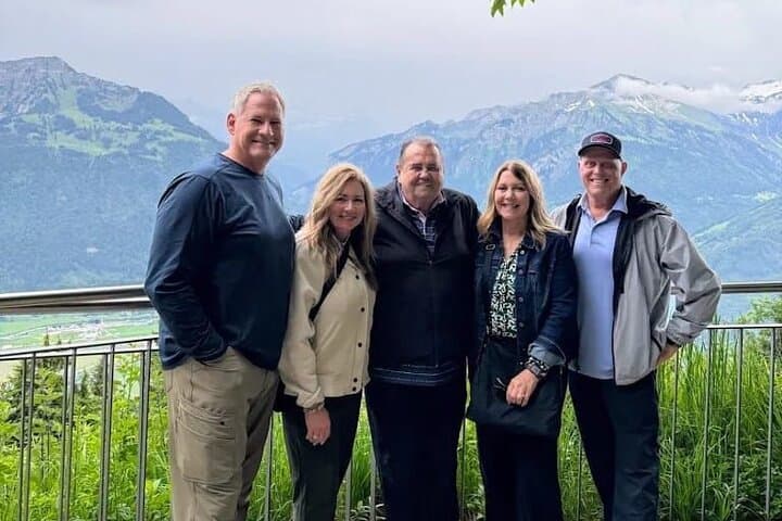 Happy guests enjoying a personalized Swiss travel experience