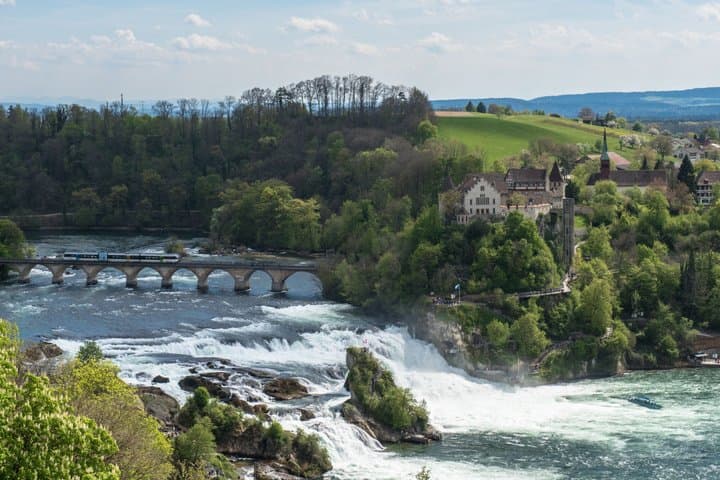 Explore Rhine Falls and City by Open Top Bus from Zurich