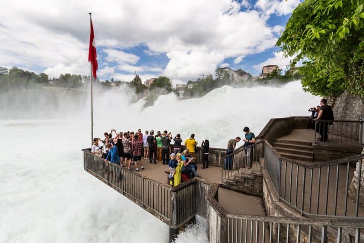 Explore Rhine Falls and City by Open Top Bus from Zurich