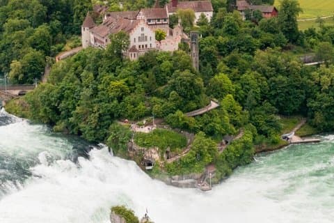 From Zurich Rhine Falls Tour with Boat Ride and Hotel Pickup