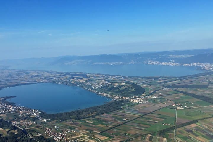 View over the lakes on the Jura and Seeland Helicopter Tour