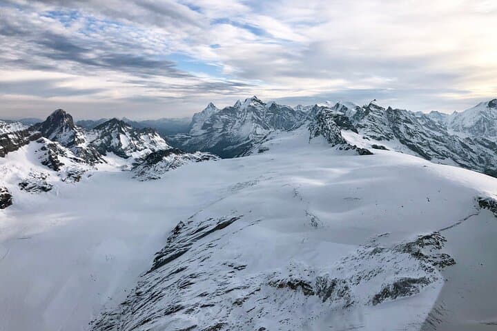 a glacier surrounded by high mountains