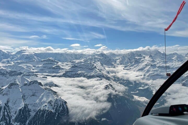 The panorama view on the Alps during the Swiss Alpine helicopter tour.