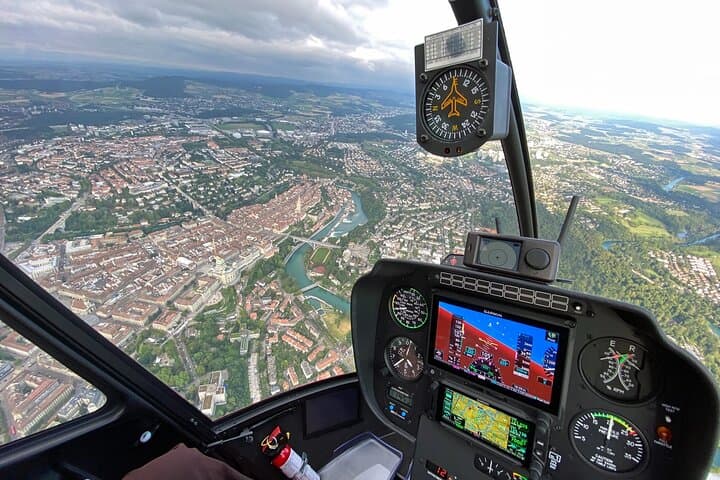 The best view out of a helicopter cockpit to see the Swiss Capital city