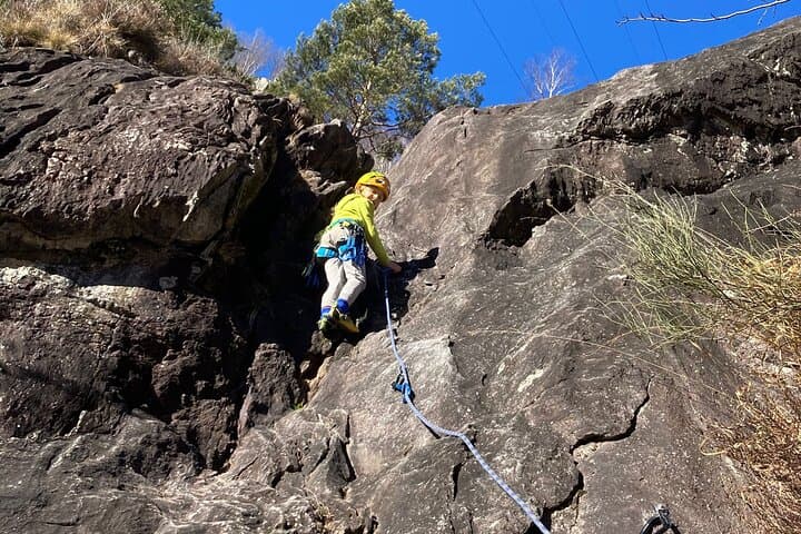 Family rock climbing near Locarno
