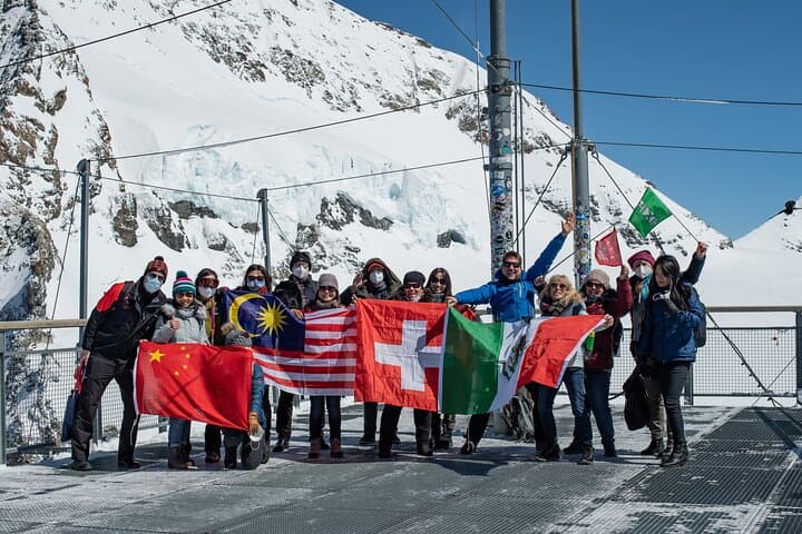 Jungfraujoch - Top of Europe Photo Tourists at 3.454 Meters