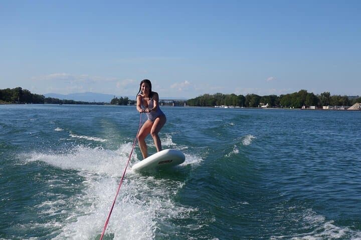 Hydrofoil and surfing on the Rhine behind a motorboat