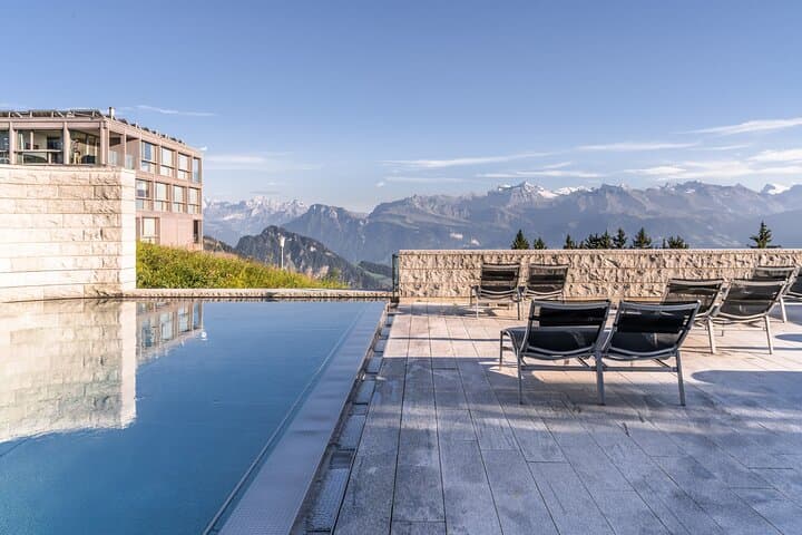 Infinity outdoor pool with pool chairs