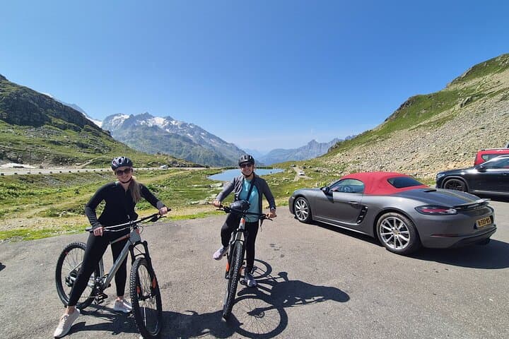 Alpine Pass Descent: Downhill Cycling Adventure in the Swiss Alps
