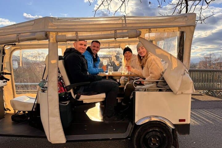 Fondue and wine private Tuk Tuk tour in Geneva