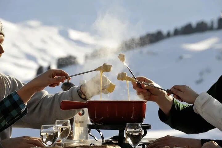 Interlaken: Sunset Sledding Adventure & Swiss Cheese Fondue