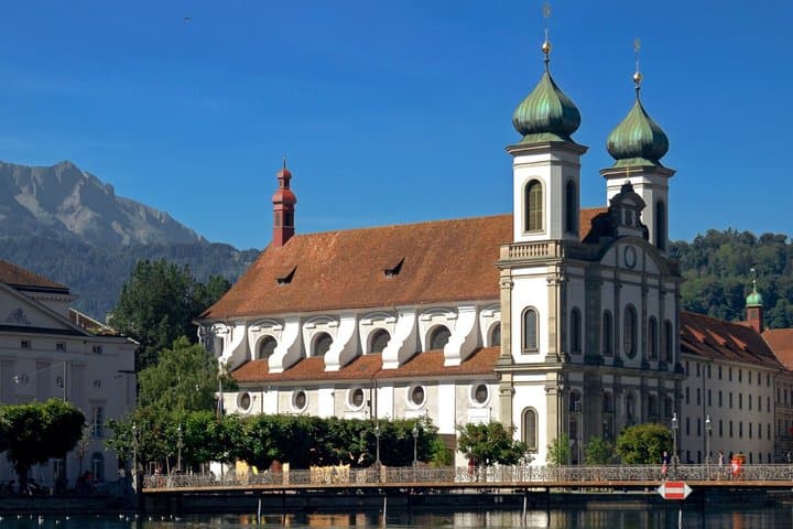 Jesuit Church: The majestic façade and iconic bulbous bell towers of this first great Baroque sacred building built in Switzerland.