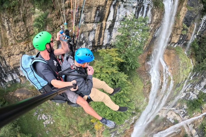 all inclusive Paragliding with Waterfall 4k Video and HD Pictures